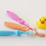 Best Baby toothbrush picks on a beige surface