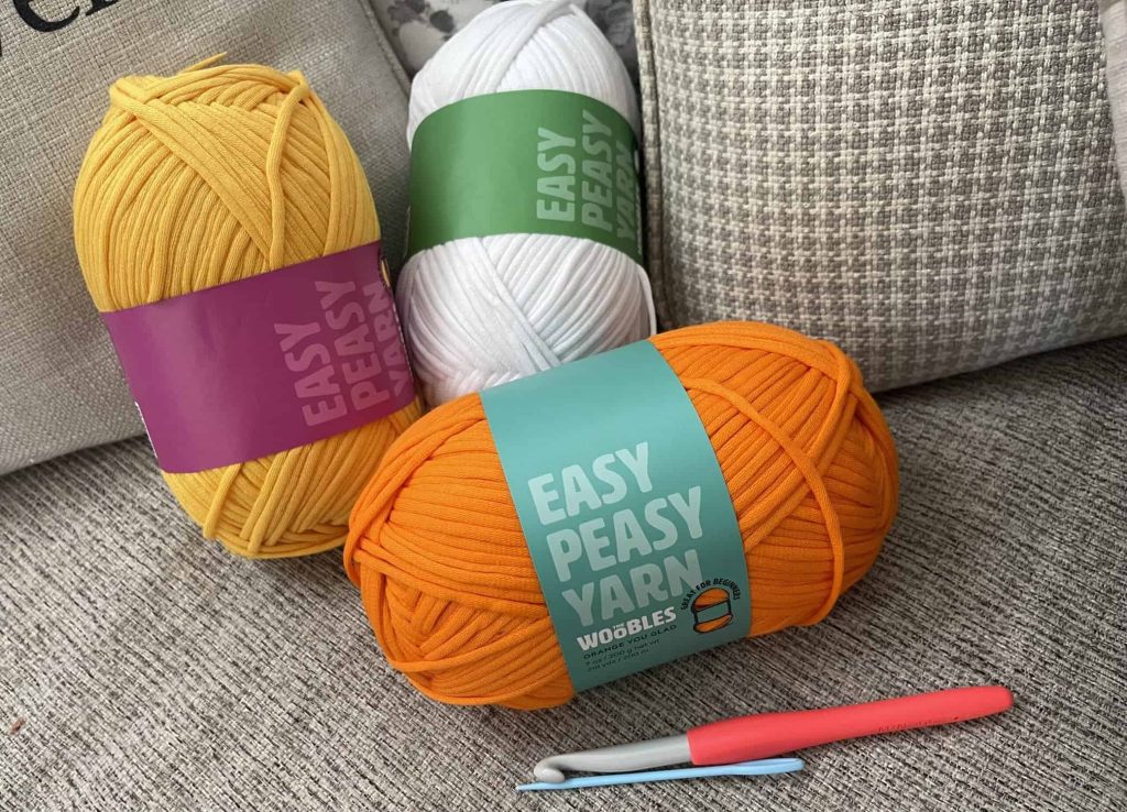 The Woobles Easy Peasy Yarn placed on a surface