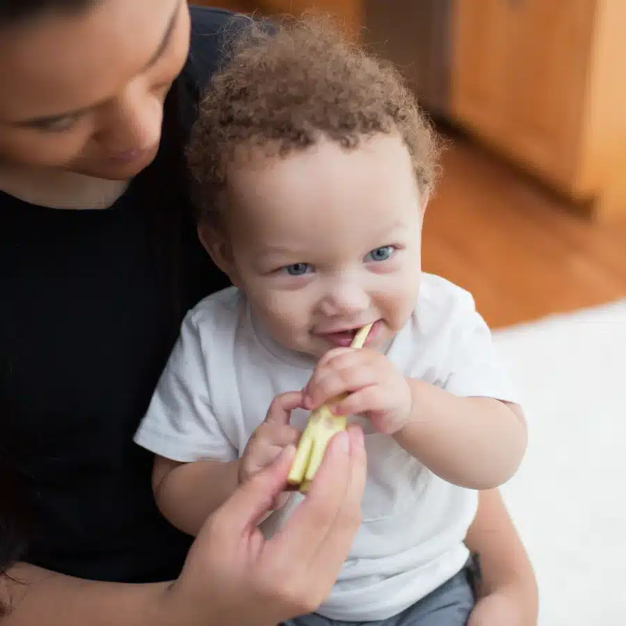 baby brushing teeth with Dr Brown s Infant to Toddler Toothbrush Giraffe​