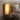 A view of a desk lamp by the bedside
