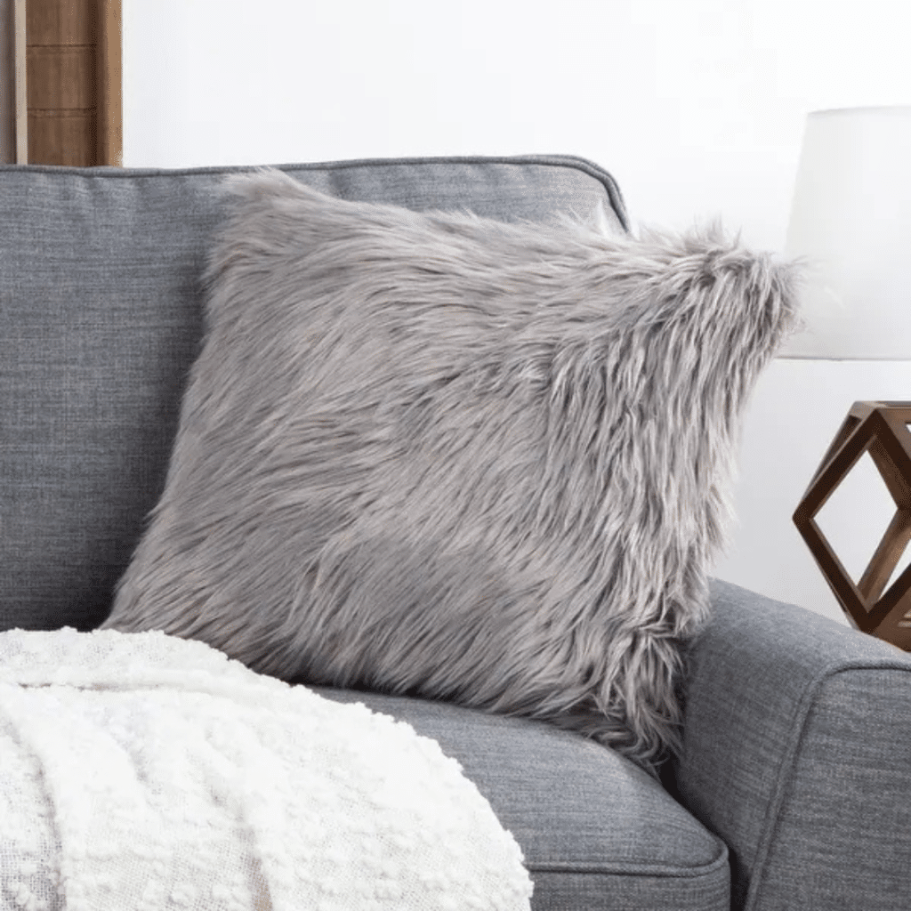 A view of a faux fur square pillow