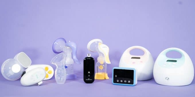 Different breast pumps isolated on a purple background