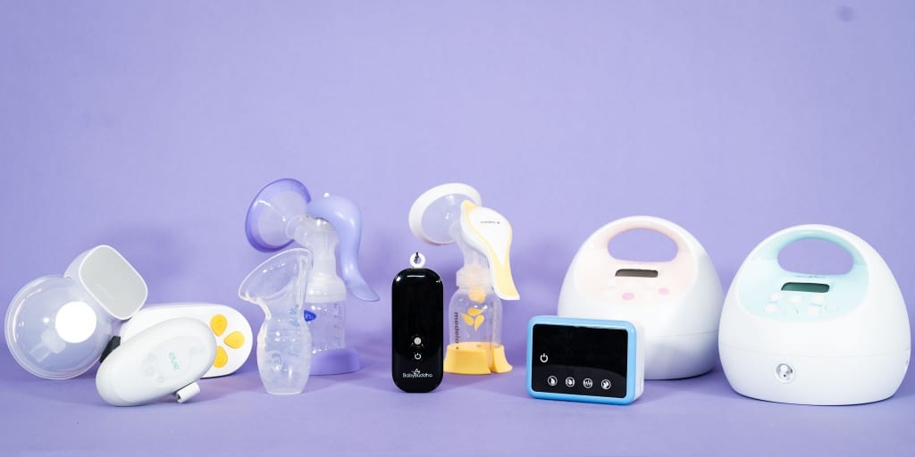 Different breast pumps isolated on a purple background