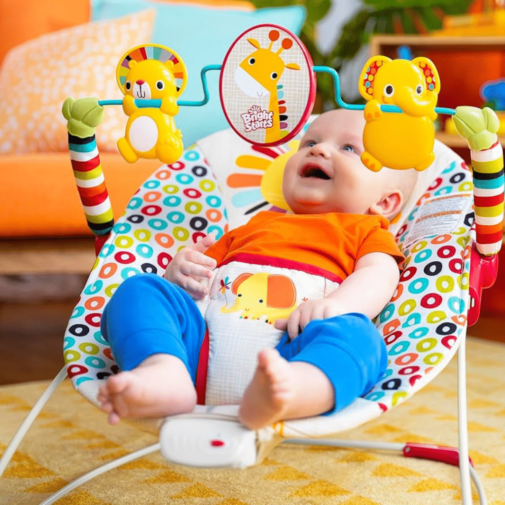 a baby playing and relaxing in Bright Starts Portable Baby Bouncer