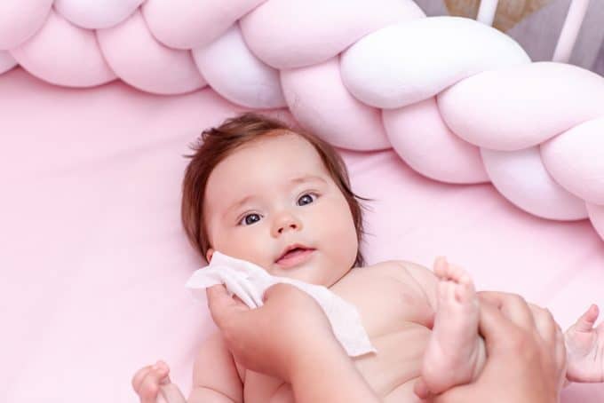 Hygiene Young Mom Wiping The Baby Skin Body And