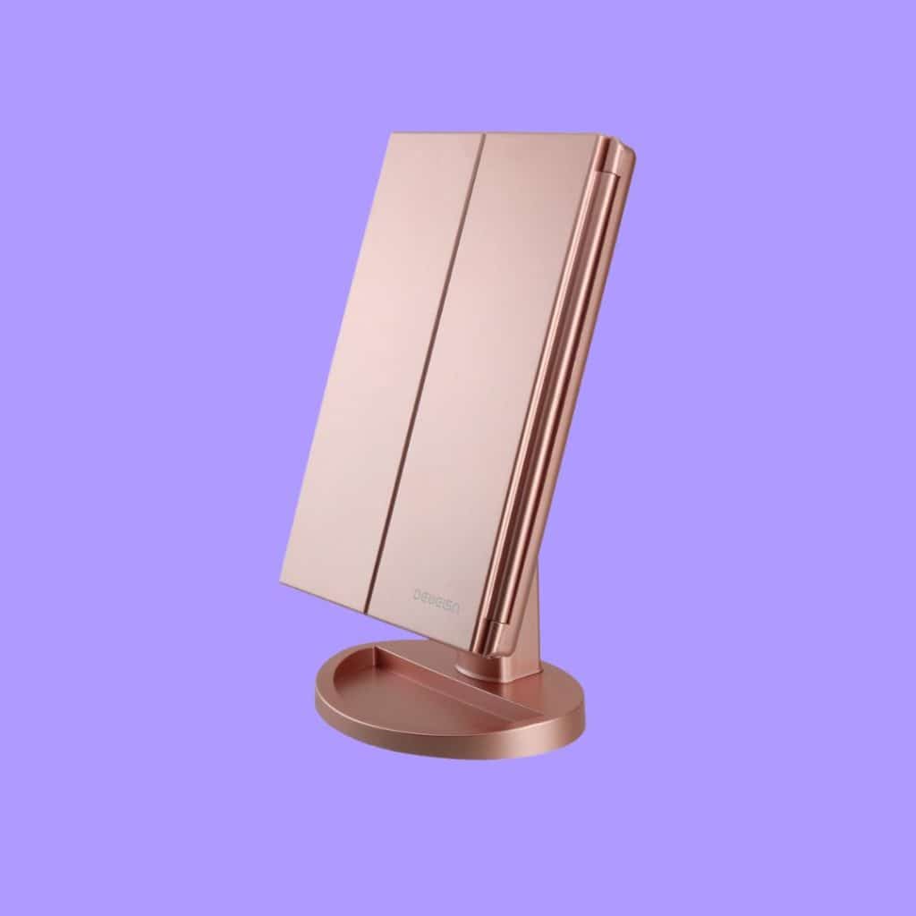 A view of DeWEISN Dresser Mount Tri Fold Vanity Mirror