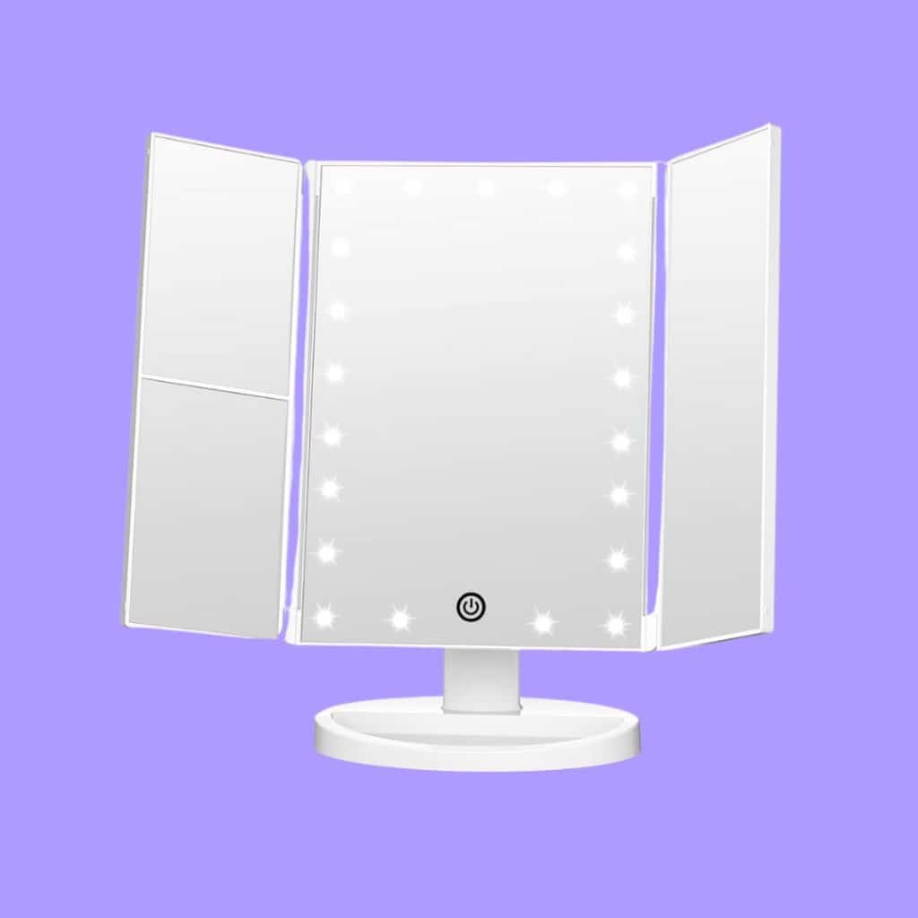 A view of FASCINATE Trifold Vanity Mirror with Lights