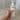 A view of a hand holding an anti age body lotion