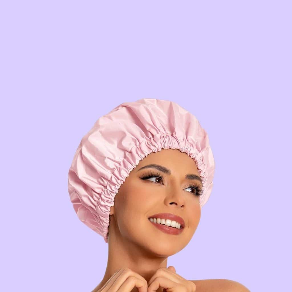 A view of a woman wearing Edoneery Reusable Shower Cap