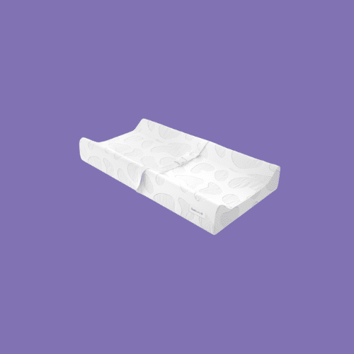 Jool Baby Soft Changing Pad Washable Cover isolated on a purple background