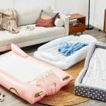inflatable toddler travel beds in a living room