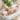 zoomed view of a mom s hands changing baby diaper in Summer by Ingenuity Contoured Changing Pad