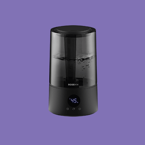 ROSEKM Quiet Ultrasonic Cool Mist Humidifier isolated on a purple background