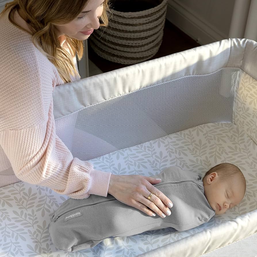 baby sleeping in SwaddleMe by Ingenuity Compression Swaddle Pod
