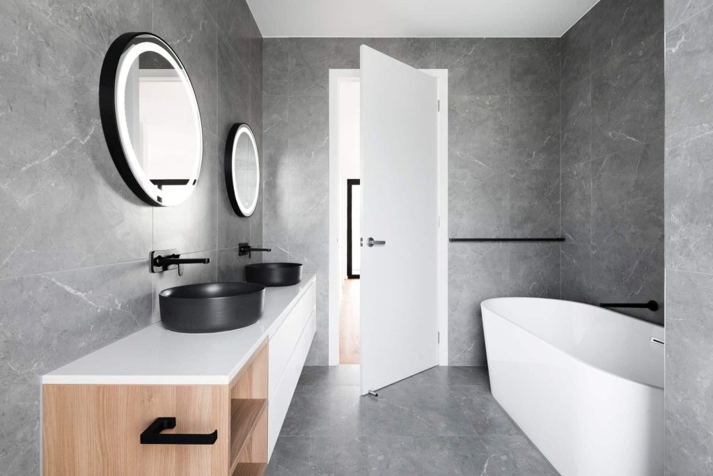 A view of a marble jack and jill bathroom