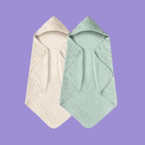 Cosy Family Pack Baby Hooded Towels isolated on a purple background