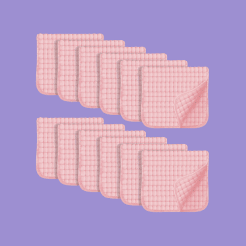 Sweet Dolphin burp cloths isolated on a purple background