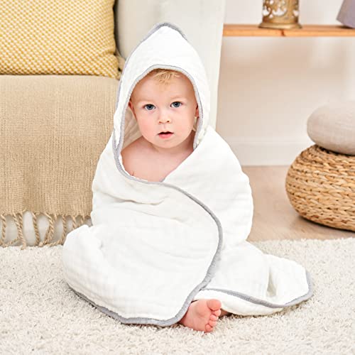 a baby wrapped in Yoofoss Hooded Baby Towel