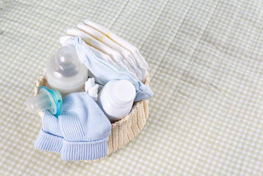 Newborn baby care supplies on changing table