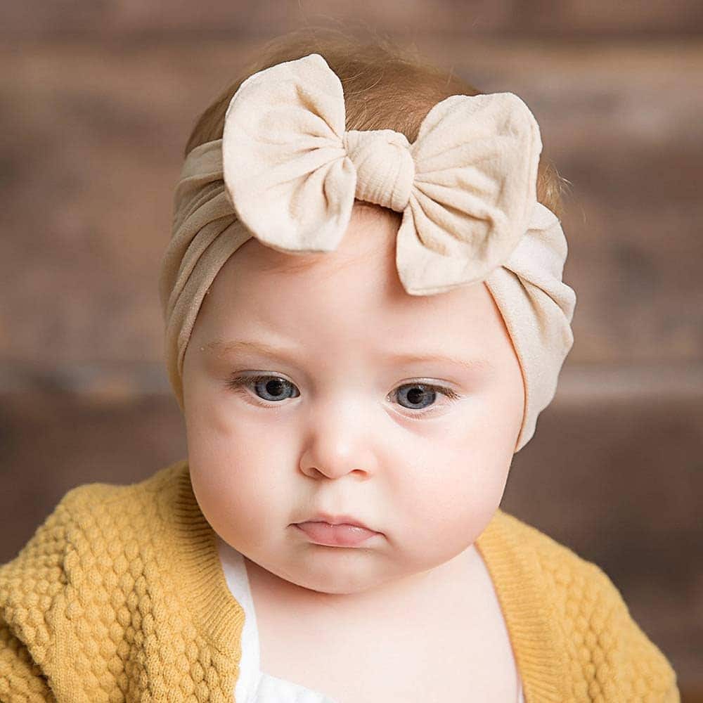 baby girl wearing CÉLLOT Super Stretchy Soft Knot Headband