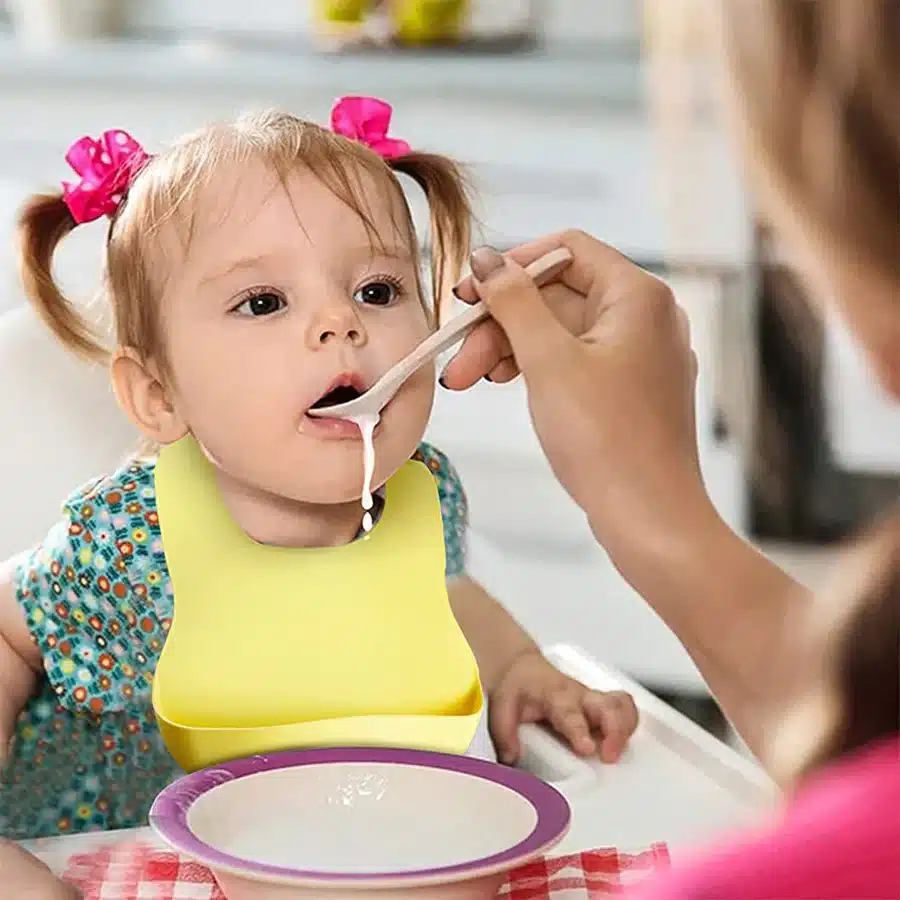 baby girl wearing PandaEar Silicone Bib