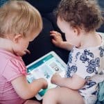 toddlers using tablet