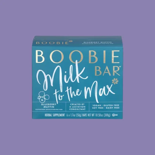 Boobie Bar Organic Superfood Snack Bars isolated on a purple background