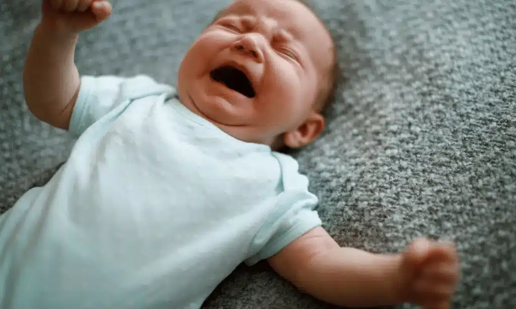 a cute baby crying out loud