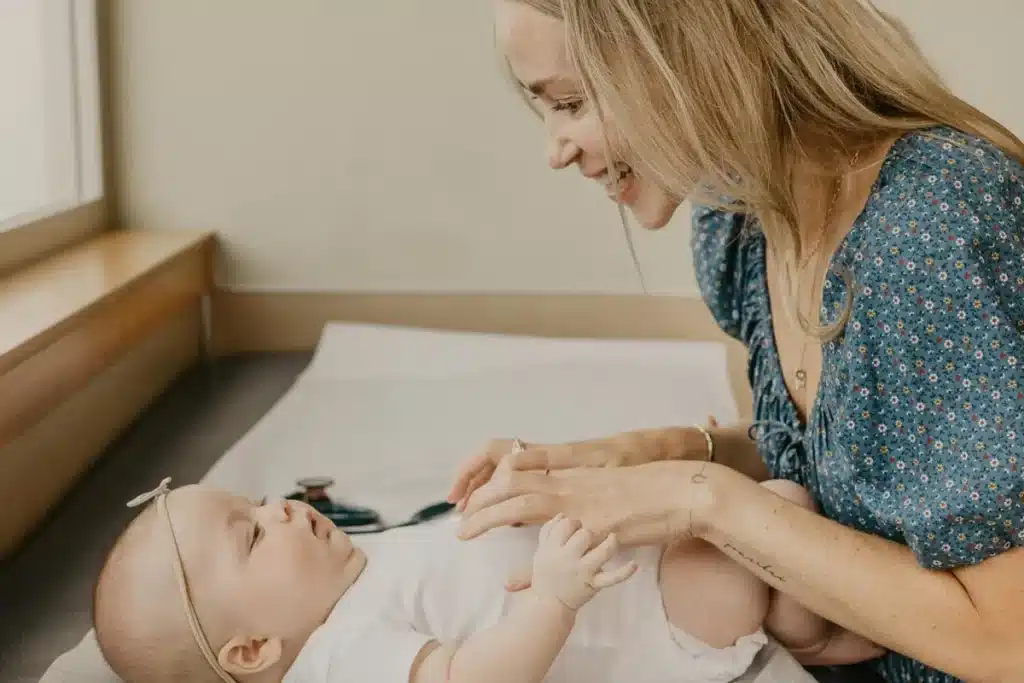 a mother soothing her baby to sleep