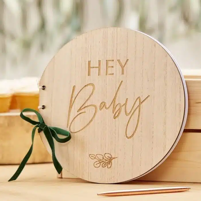 hey baby wooden memory book placed on a surface