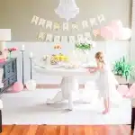minimal pink and white decor for sip and see party